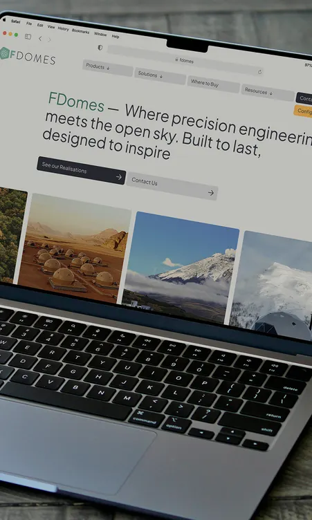 fdomes website displayed on laptop screen